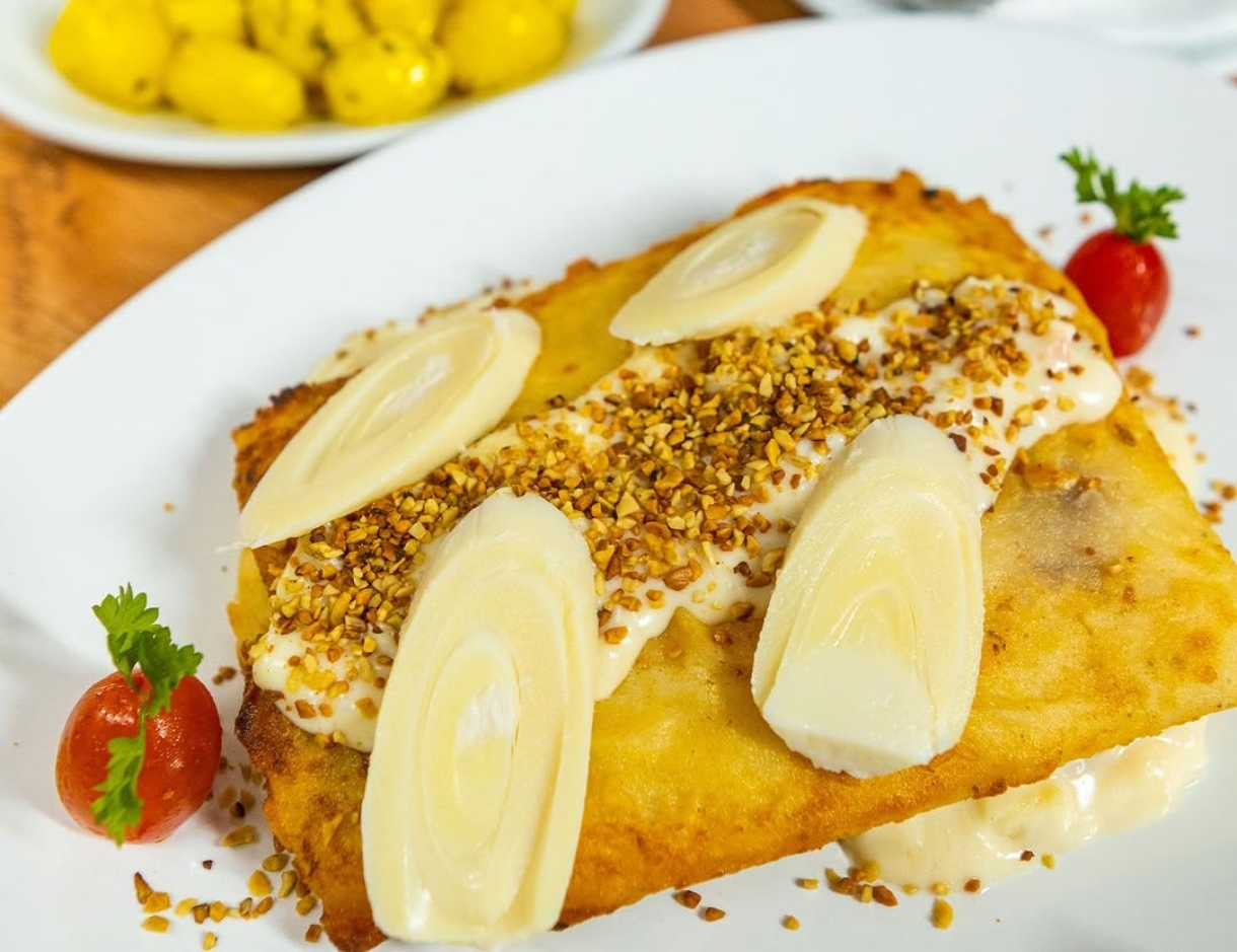 Linguado Moda Chefe com molho de palmito cremoso - Porto Grill Frutos do Mar
